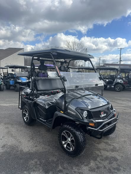 2025 TrailMaster Taurus 200 side view with windshield and all-terrain tires