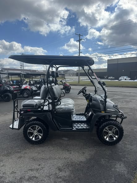 TrailMaster Taurus 200 side profile showing four-passenger seating