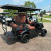 black-verdi-aspen-s4-lithium-golf-cart-2 rear quarter of black Verdi Aspen S4 showing rear flip seat