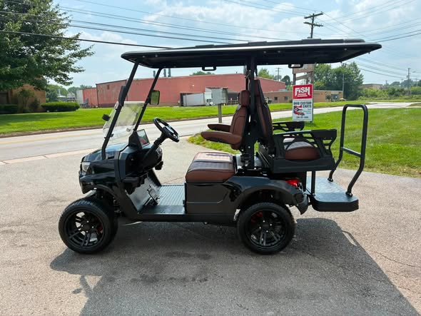 black-verdi-aspen-s4-lithium-golf-cart-4 side profile of black Verdi Aspen S4 with grab bar and cooler