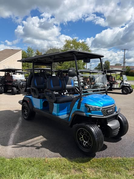light blue ICON i60LX six passenger cart front with windshield