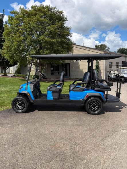 light blue ICON i60LX lithium golf cart side profile seating six
