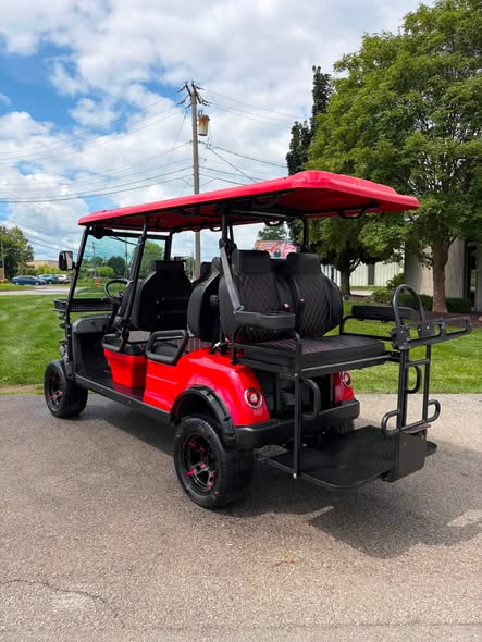 red-2023-epic-e60l-6-passenger-golf-cart-4 red Epic E60L golf cart rear quarter with red-accent black wheels