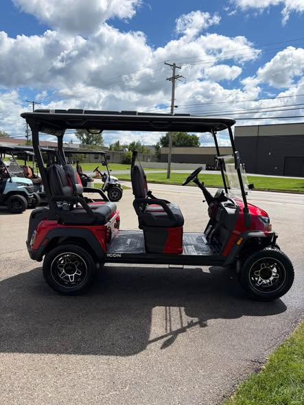 red-2026-icon-i40fx-lithium-5 red ICON i40FX golf cart side profile showing four forward seats