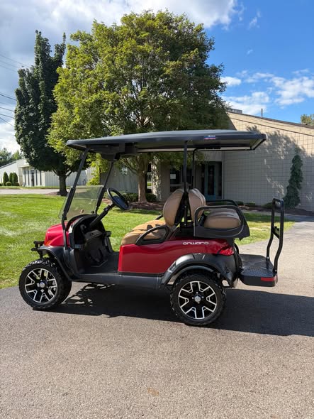 red-club-car-onward-48v-electric-5 red Club Car Onward 48V side profile under extended roof