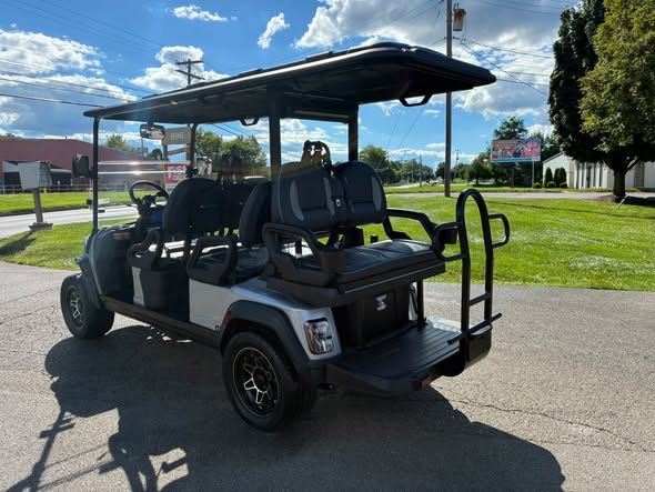 silver ICON i60LX rear quarter view showing grab bar and footrest