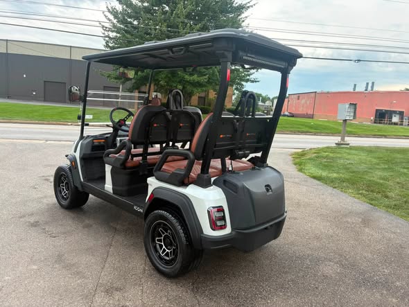 white 2026 ICON i40FX rear quarter view on dealer lot
