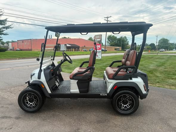 white ICON i40FX lithium cart side profile with forward-facing seating